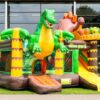 location château gonflable dinosaure, Multiplay Dinoworld, jeux gonflables enfants, château gonflable avec toboggan, événement enfants