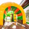 location château gonflable dinosaure, Multiplay Dinoworld, jeux gonflables enfants, château gonflable avec toboggan, événement enfants